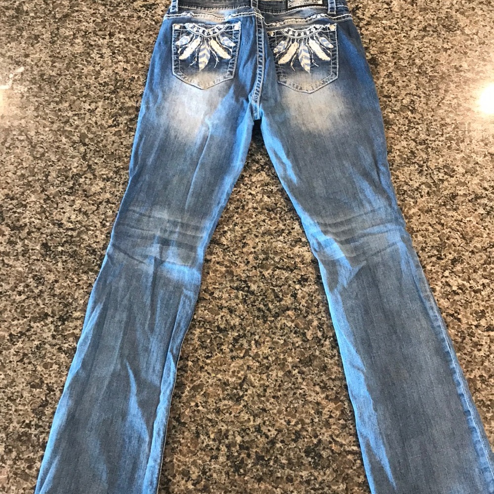 Distressed Grace in LA jeans
